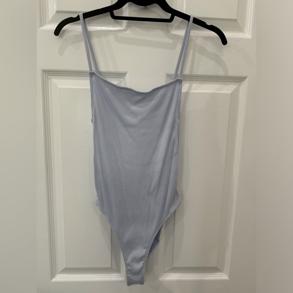 Out from under strappy bodysuit